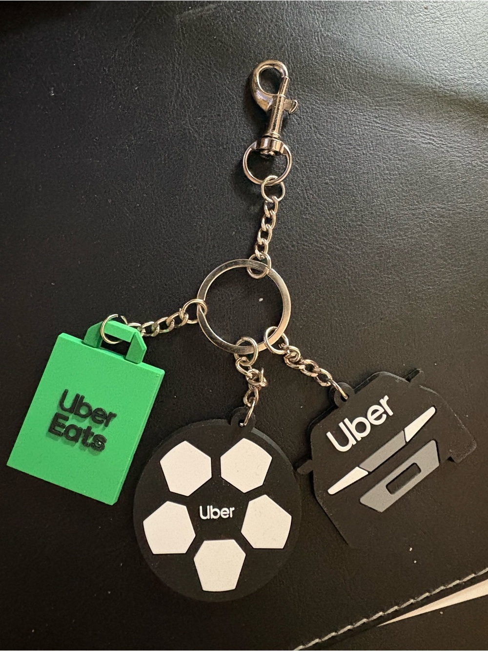 Brand new never used Uber Eats Keychain Trio - Green, Black, White